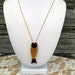 Articulated slider Fish Necklace Gold Tone And Bakelite or Lucite