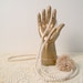 golden cast iron hand statue
