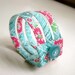 Triple strand cuff bracelet in retro red and aqua floral
