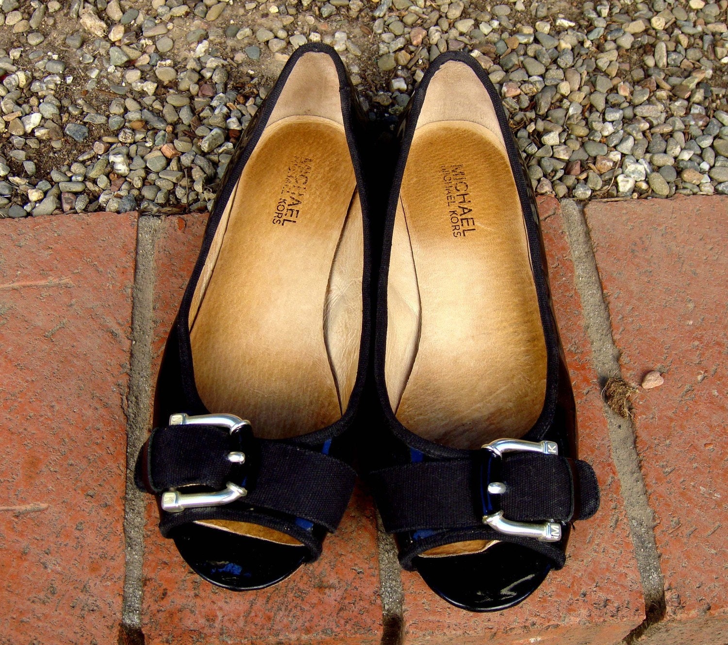 black flats with silver buckle