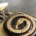 Snake Pendant Black and Gold Serpent