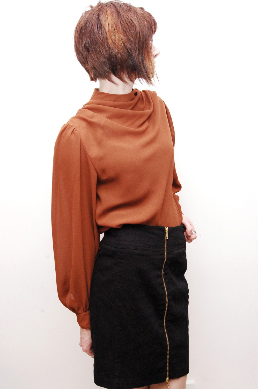 rust colored blouse