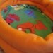 Flipping Dogs and Orange Deluxe Small Animal Bed