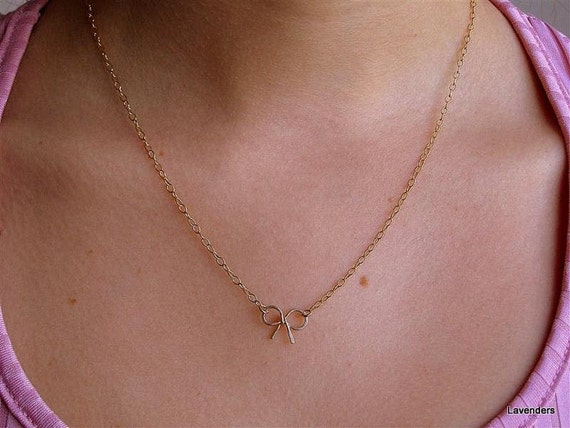 Items similar to Bow Necklace , Gold Necklace , Gold Bow Charm , Small ...