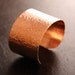 Egyptian cuff - popular wide band wristlet of hammered copper design