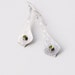 Long silver earrings accented with gorgeous green Peridot cabochons bezel set on a unique curved form - "Olivine Earrings"