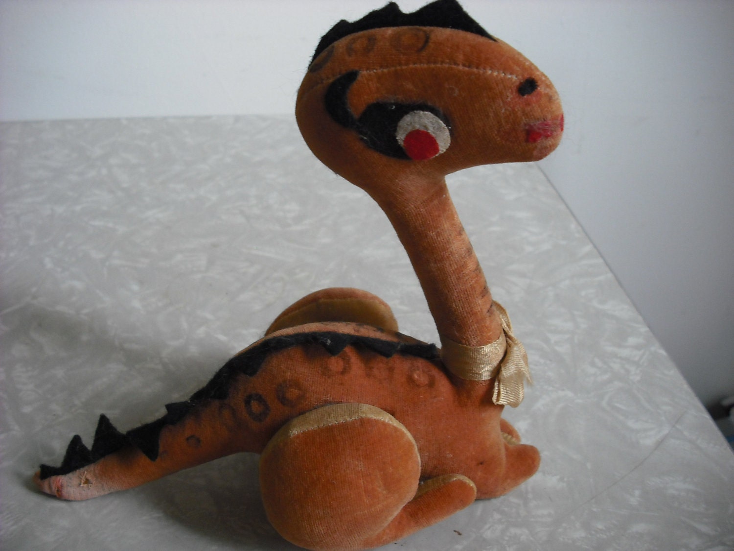 vintage stuffed dinosaur