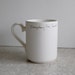 Everyday I'm hustlin' mug