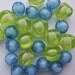 Buttons or beads blue and yellow round faceted