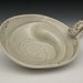 bulgy celadon bowl with handle and white gold luster