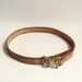 tooled belt / 70s 1970s tooled leather belt / brass butterfly buckle / small waist belt / vintage belt