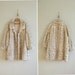 1960s vintage soft and creamy faux leopard fur coat