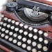 TREASURY ITEM...1926 Red Underwood Four Bank Portable Typewriter and case