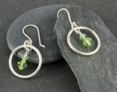 Flirty sterling silver earrings with Swarovski crystals, green, shiny, movement, kinetic, fun, feminine, handmade, modern, sparkly Flirty sterling silver earrings with Swarovski crystals, green, shiny, movement, kinetic, fun, feminine, handmade, modern, sparkly