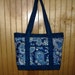 Blue white green paisley floral quilted with navy and green vine print trim