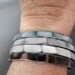 Set of four vintage mother of pearl bangle bracelets in great condition