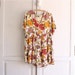 floral maxi print 80s romper . Passion Flower onesie
