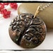 005 Black and Gold Handshaped Clay Tree of Life Pendant no Chain