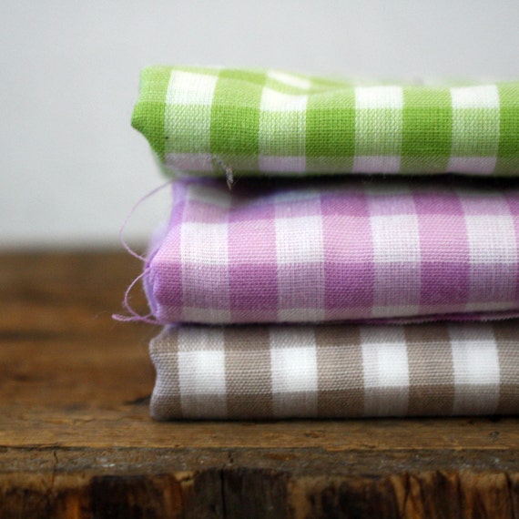green, purple, and brown gingham fabric