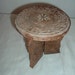 hand carved 3 legged fold up table/ pot stand