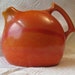 Vintage RumRill Jug Pitcher in gorgeous orange