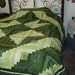 Striking Log Cabin Quilt in Shades of Green