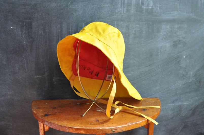 yellow rain slicker and hat