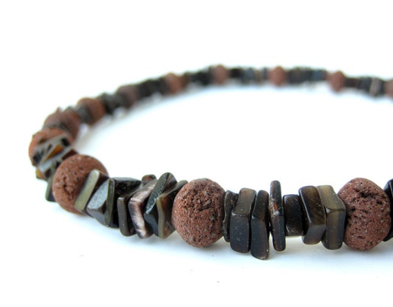 Shell necklace for men Hawaiian Shell Necklace Collection. Hawaiian puka, coconut, kukui, koa wood, and shell necklaces. All are handmade from Hawaii. Bulk Orders: Purchase by the dozen for discount pricing Contact Us for more information. Click on any picture for a larger view.