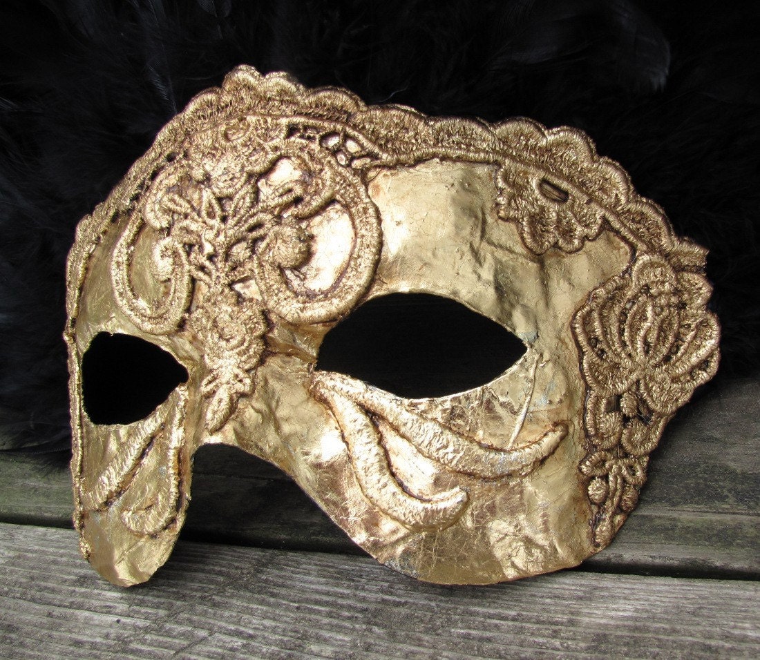 Gold Venetian masquerade mask with black feather crown Flirte