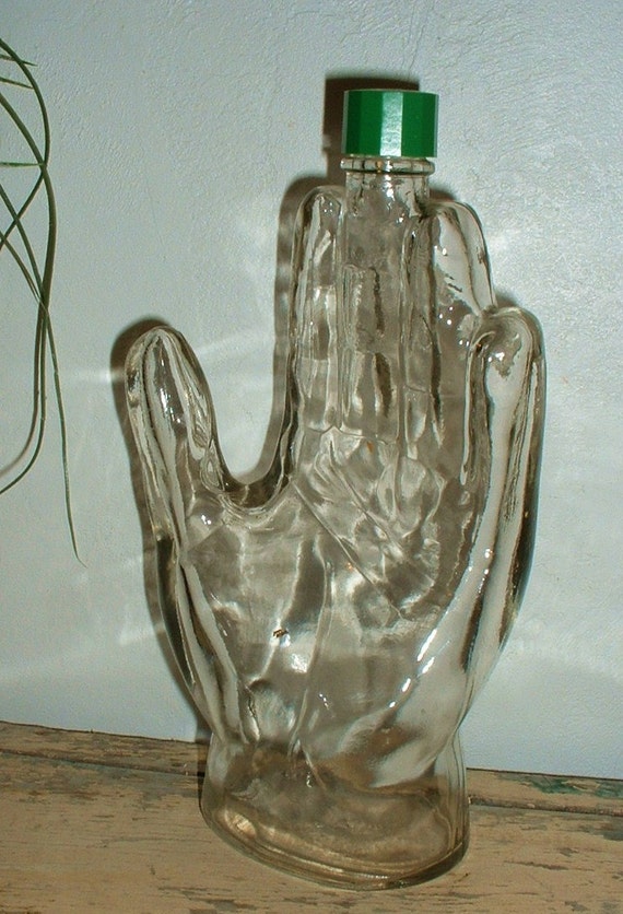 Download Vintage Clear Glass Hand Shaped Bottle