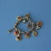 charm bracelet / 1960s charm bracelet / 60s goldtone bracelet / costume jewlery