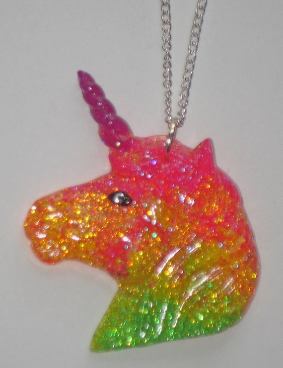 Neon rainbow glitter UV glow unicorn head necklace