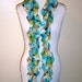 Jersey knit scarf with elastic ruffle, turquoise and brown floral print