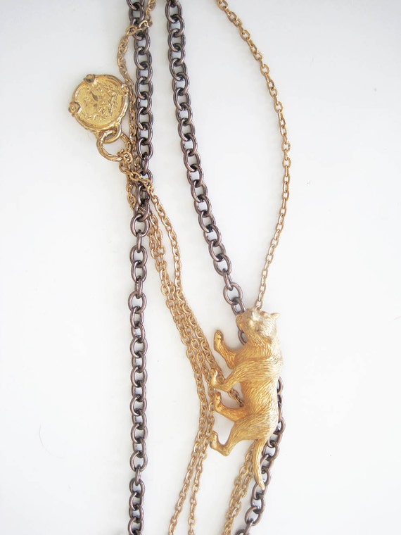 Items similar to vintage cougar necklace on Etsy