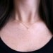Teeny Tiny Gold Skull Necklace