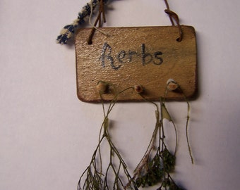 Ann's miniature herb rack with herbs