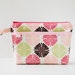 pink medallion diaper clutch