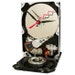 Hard Drive Clock Accented with Disk Clamp, Spindle Shaft and Zigzag Hand. (H)