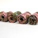 Hand rolled fiber beads in old rose fantasy printed cotton