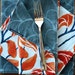 Reversible napkins with climbing vines and arches