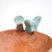 Ring holder bowl love birds orange and blue