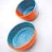 two bowls in orange and turquoise