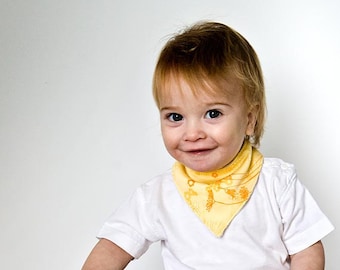 Baby Bandana Bib in yellow. Organic drooling Bib with golden flowers. Eco Friendly Bib.