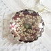 Queen Anne's Lace Beneath Glass Atop Glowing Burgundy Background Victorian Pressed Flower Crown Pendant-Symbolizes Peace