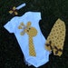 Gia the Giraffe Rufflebum outfit with matching leg warmers and headband
