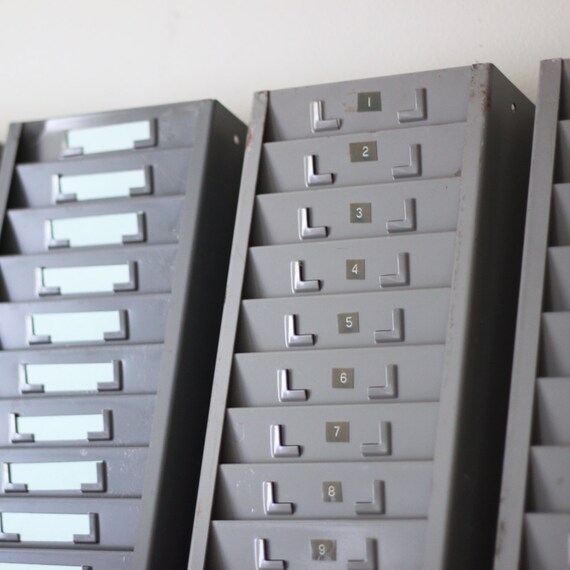 industrial gray metal time card rack