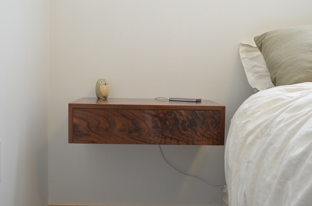 Floating bedside tables in walnut dovetailed by tealandgold