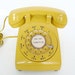 Retro and vintage yellow New York Tel rotary phone