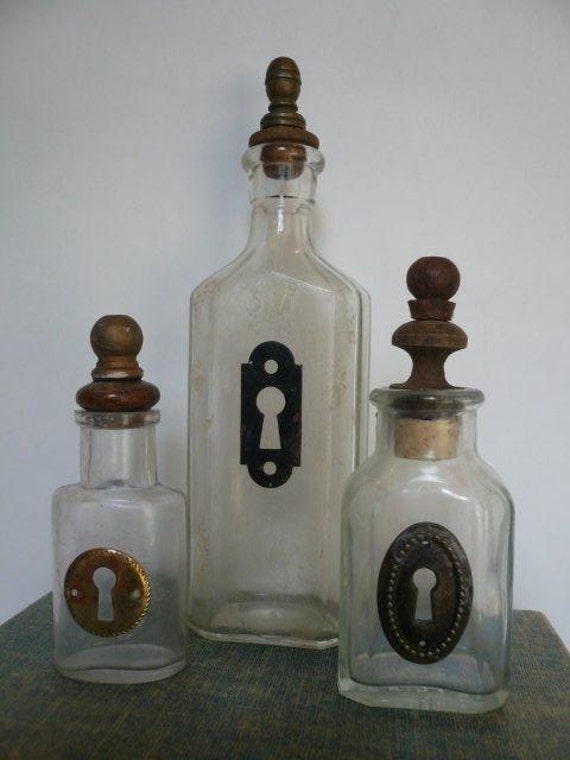 Items similar to Collection of Vintage Medicine Bottles with Keyholes