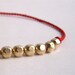 Gold Filled and Red Silk Bracelet